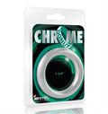 Chrome donut accessory with round chrome ring and green center, in blister pack