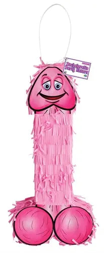 Pink cartoon pecker piñata with face, fringe tassels, and hanging loop