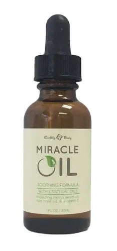 Miracle Oil 1 fl oz dropper bottle with amber liquid and black cap