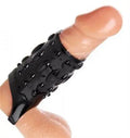 Black textured sex sleeve with molded bumps and open cuff