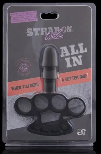 Black strap-on tool with multiple round grips on base
