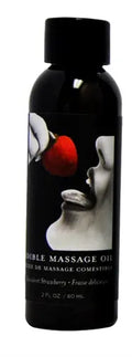 Edible massage oil bottle, black with strawberry label and screw cap