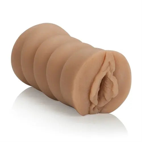 Flesh-tone realistic sex toy with cupped opening, curved shape