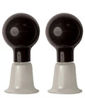 Pair of black nipple suction cups with clear bases
