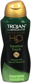 Water-based personal lubricant bottle with gold cap and Sensitive Touch label