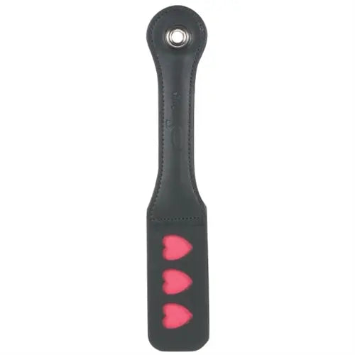 Leather impression paddle with heart-shaped pink accents and stitched black handle
