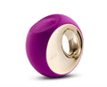 Purple silicone ring holder with gold-toned metal ring and white inner face