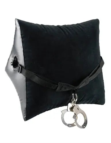 Black padded position restraint with adjustable strap and metal handcuffs