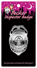 Silver round inspector badge with central emblem, OFFICIAL text, and top hole.