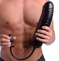 Black inflatable dildo with ridged handle and power cord, held upright in hand
