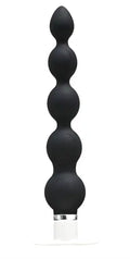 Dark segmented anal plug with flared base