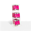 Cooling arousal oil ampoule tower display with pink labeled boxes