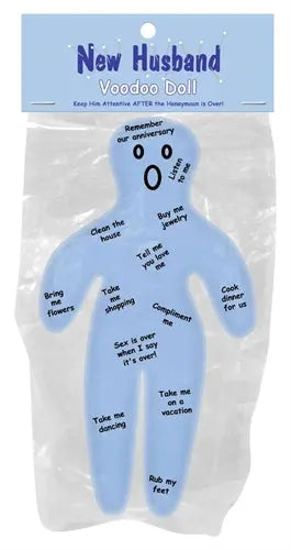 Light blue voodoo doll in clear plastic bag, printed text on body