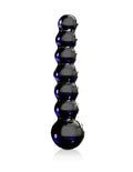 Black glossy segmented anal plug with rounded ends and purple accent lights