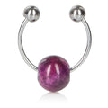 Purple chain nipple clamp with purple orb centerpiece and two metal ball ends