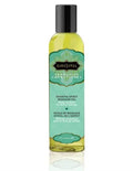 Aromatic massage oil bottle with black pump cap, yellow-green bottle, Soaring Spirit label