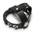 Black rubber cock harness with snap-on metal rings and buckle hardware