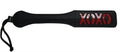 Black Sex and Mischief paddle with XOXO graphic on handle