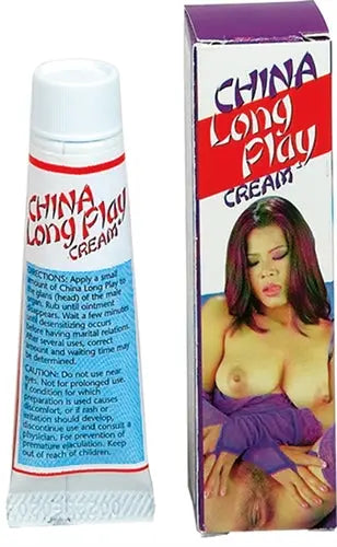 Cream squeeze bottle with red label, next to boxed product with woman graphic.