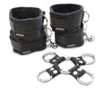 Black padded cuff and hog tie restraint set with metal rings