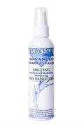 Misting spray bottle with white plastic pump and blue label
