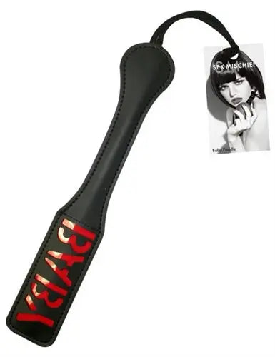 Black leather impression paddle with red decorative lettering and handle