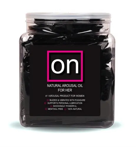 On natural arousal oil jar with black label and pink On logo