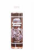 Apple Cinnamon lotion bottle, brown plastic with white label and flip-top cap