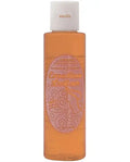 Vanilla body lotion bottle, amber-toned plastic with white cap