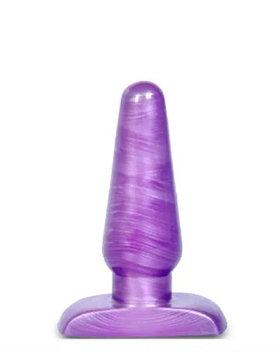 Purple plug with rounded base and curved shaft