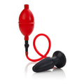 Expandable butt plug with black base and red inflatable bulb, flexible red ring handle
