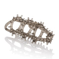 Smoke-colored cock cage with hinged rings and pronged spikes