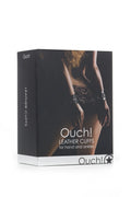 Black leather hand and ankle cuffs in a retail box