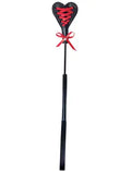 Black stick with red heart top and crossed laces, tied with a red bow