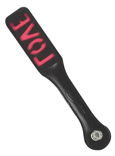 Black leather impression paddle with pink LOVE text and round silver rivet