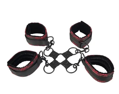 Black and red hog-tie leg restraints with chain links and metal rings