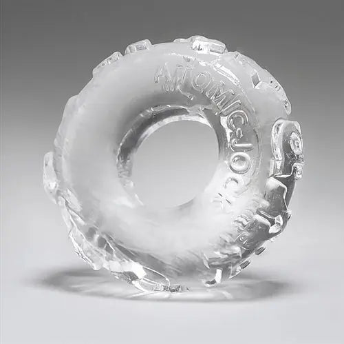 Clear translucent cockring with embossed atomic pattern and circular opening