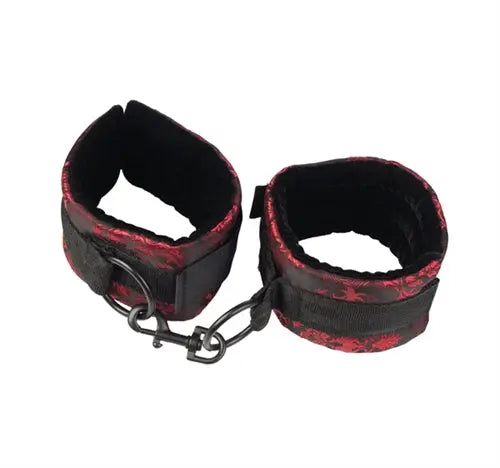 Scandal universal cuffs, black and red patterned, with chain and metal rings