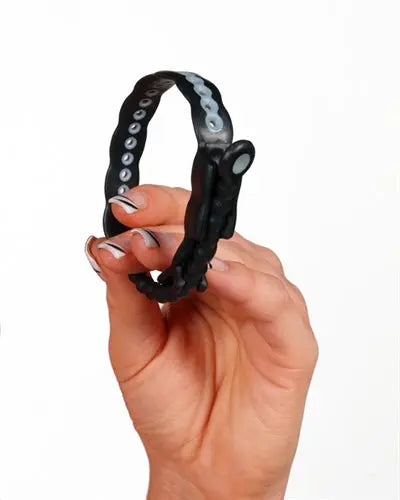 Black erection ring with beaded band and flexible clasp