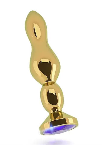 Gold metal butt plug with dark purple gemstone accent, 4.8 inch