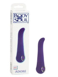 Purple curved adult pleasure toy with gem ring accent near base