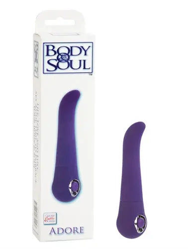Purple curved adult pleasure toy with gem ring accent near base