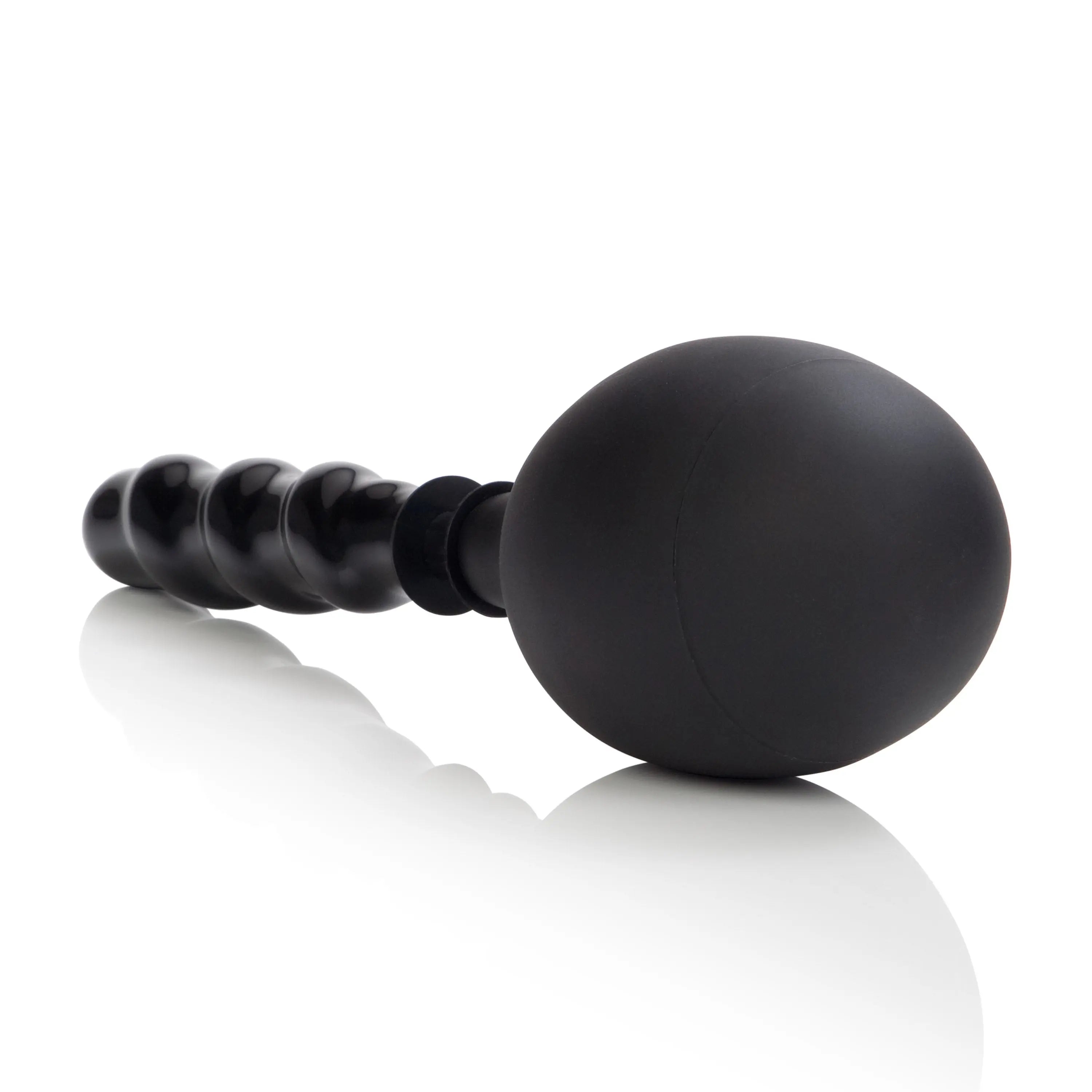 Dark round cleanser applicator with ridged handle