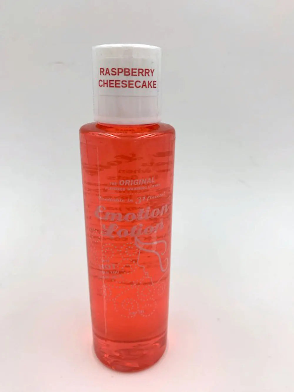 Raspberry cheesecake lotion bottle with red liquid, white cap and label
