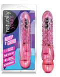 Pink vibrating pleasure toy with textured grip and bead-like ridges