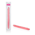 Translucent pink slim sex toy in blister pack, ribbed veined surface.
