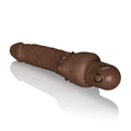 Brown waterproof clit vibrator with ribbed shaft and rounded tip, circular opening