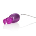 Pink rabbit-shaped bullet toy with textured surface and attached cord