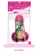Pink novelty candy dish shaped like a penis, filled with multicolor candy pieces.