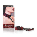 Red lace choker collar with metal ring buckle and attached chain leash